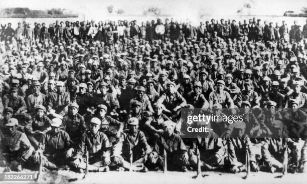 Soldiers of the Red Army's Fourth Front Army led by Chairman Mao Zedong are pictured in 1935 in northern Shensi at their arrival after the long...