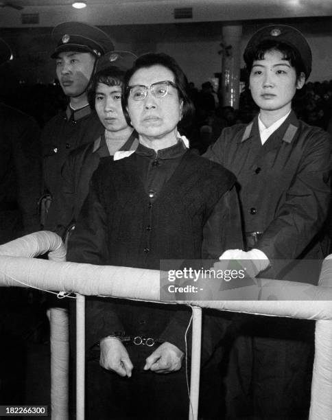 Jiang Qing, one of the defendants of the "Gang of four" and the widow of late President Mao Zedong, is seen handcuffed in the dock while being...