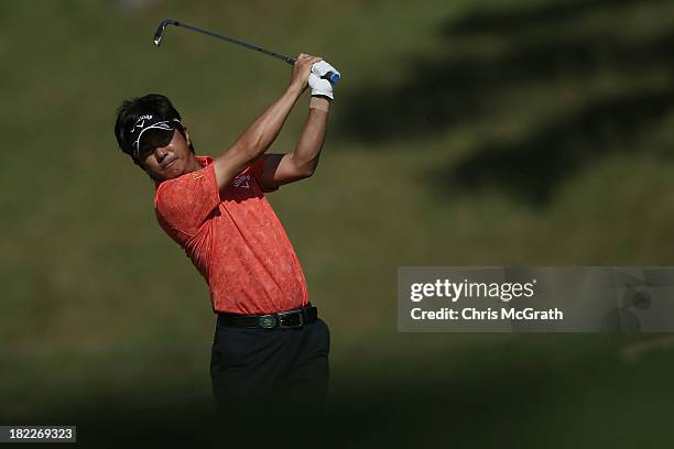 Keiichiro Fukabori of Japan plays his second shot on the fourth hole during day four of the Panasonic Japan Open at Ibaraki Golf Club on September...