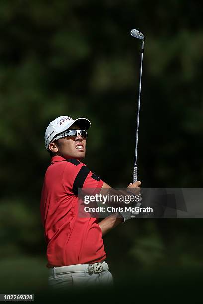 Rory Hie of Indonesia plays his second shot on the fourth hole during day four of the Panasonic Japan Open at Ibaraki Golf Club on September 29, 2013...