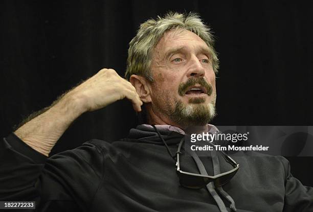 John McAfee participates in a fireside chat at the C2SV Technology Conference Day Three at McEnery Convention Center on September 28, 2013 in San...