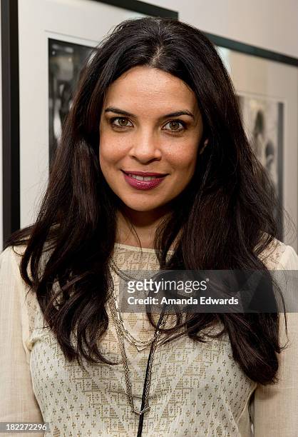 Actress Zuleikha Robinson attends the opening of musician Ben Folds' photo exhibition "Between The Notes" at Gallery 169 on September 28, 2013 in...