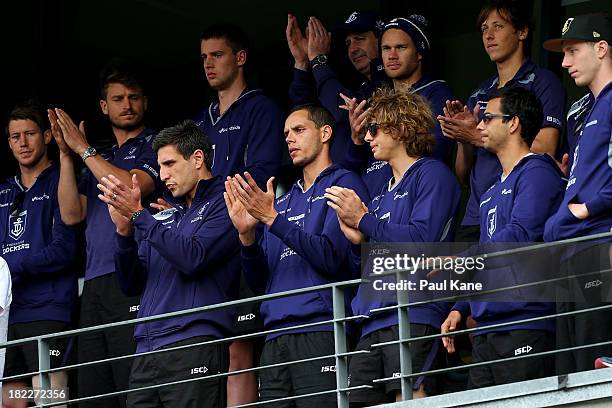 Dockers players acknowledge supporters during the Fremantle Dockers Fan Day at Patersons Stadium on September 29, 2013 in Perth, Australia. The...