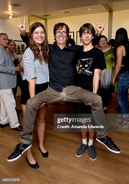 Musician and photographer Ben Folds and his children Gracie Folds and Louis Folds attend the opening of Folds' photo exhibition "Between The Notes"...