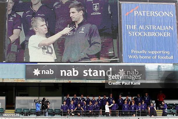 Matthew Pavlich adresses the supporters after the team was introduced to supporters during the Fremantle Dockers Fan Day at Patersons Stadium on...