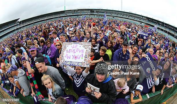 Dockers fans show their support before the team is introduced during the Fremantle Dockers Fan Day at Patersons Stadium on September 29, 2013 in...