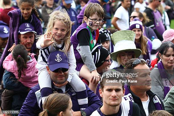Dockers fans show their support before the team is introduced during the Fremantle Dockers Fan Day at Patersons Stadium on September 29, 2013 in...