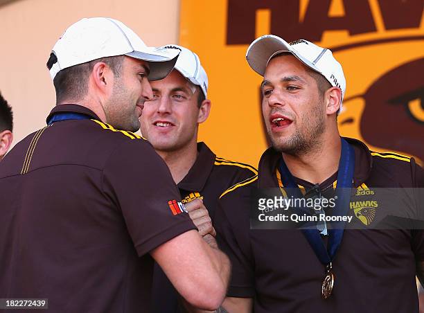 Brian Lake and Lance Franklin of the Hawks shake hands during the Hawthorn Hawks Fan Day at Glenferrie Oval on September 29, 2013 in Melbourne,...