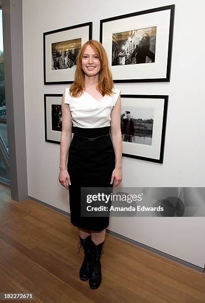 Actress Alicia Witt attends the opening of musician Ben Folds' photo exhibition "Between The Notes" at Gallery 169 on September 28, 2013 in Santa...