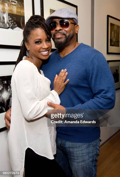 Actress Shanola Hampton and her husband Daren Dukes attend the opening of musician Ben Folds' photo exhibition "Between The Notes" at Gallery 169 on...
