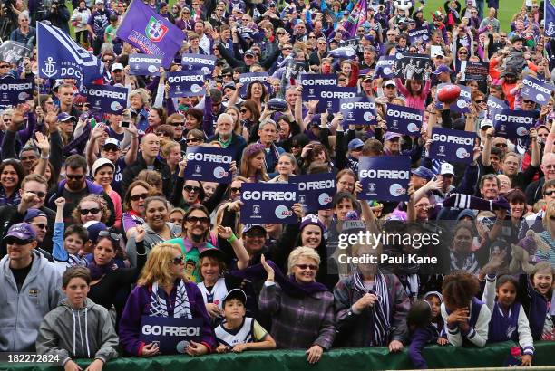 Dockers fans show their support before the team is introduced during the Fremantle Dockers Fan Day at Patersons Stadium on September 29, 2013 in...