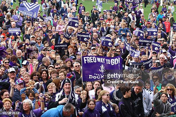 Dockers fans show their support before the team is introduced during the Fremantle Dockers Fan Day at Patersons Stadium on September 29, 2013 in...