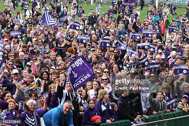 Dockers fans show their support before the team is introduced during the Fremantle Dockers Fan Day at Patersons Stadium on September 29, 2013 in...