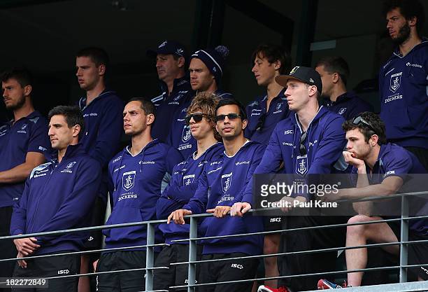 Dockers players look on the team is introduce to supporters during the Fremantle Dockers Fan Day at Patersons Stadium on September 29, 2013 in Perth,...