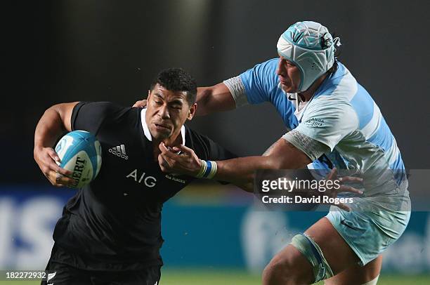 Charles Piutau of the All Blacks is tackled by Patricio Albacete during The Rugby Championship match between Argentina and the New Zealand All Blacks...