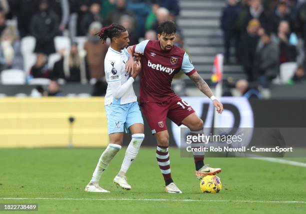 West Ham United's Lucas Paqueta and Crystal Palace's Michael Olise during the Premier League match between West Ham United and Crystal Palace at...