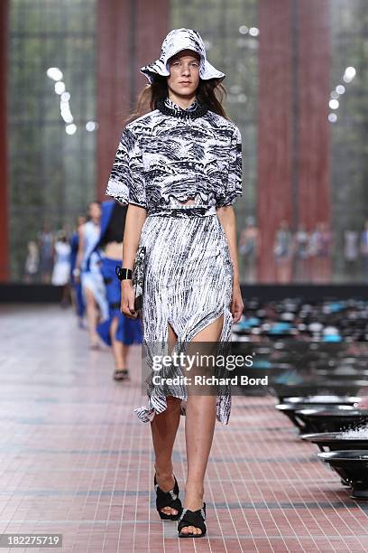 Model walks the runway during the Kenzo show at 'Cite du Cinema' of Saint-Denis as part of the Paris Fashion Week Womenswear Spring/Summer 2014 on...
