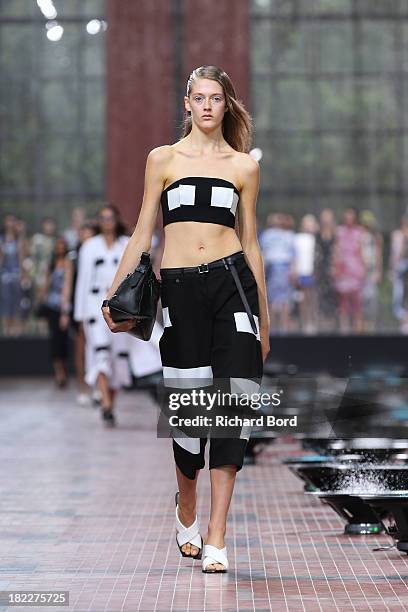 Model walks the runway during the Kenzo show at 'Cite du Cinema' of Saint-Denis as part of the Paris Fashion Week Womenswear Spring/Summer 2014 on...