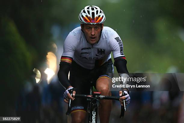 Marcus Burghardt of Germany launches an attack during the Elite Men's Road Race, a 272km race from Lucca to Florence on September 29, 2013 in...