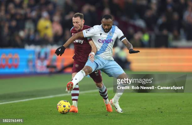 West Ham United's Vladimir Coufal and Crystal Palace's Jordan Ayew during the Premier League match between West Ham United and Crystal Palace at...