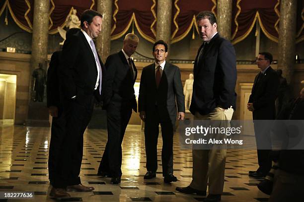 House Majority Leader Rep. Eric Cantor and Rep. Steve Womack on their way to the House Chamber for a vote September 29, 2013 on Capitol Hill in...