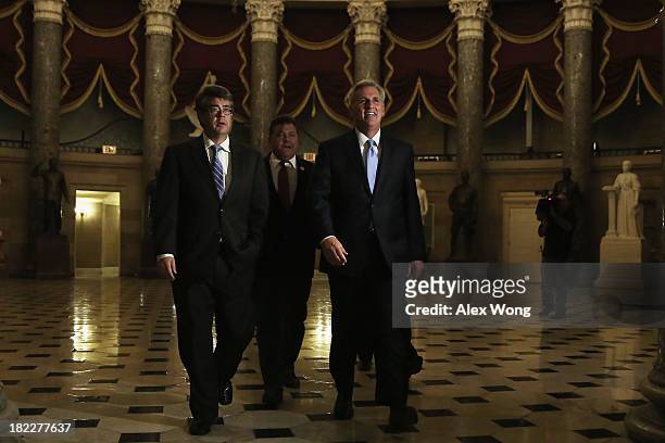 House Majority Whip Rep. Kevin McCarthy and Rep. Lee Terry on their way to the House Chamber for a vote September 28, 2013 on Capitol Hill in...