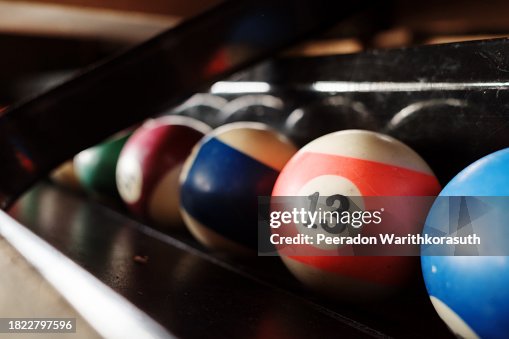 Pool billiards ball on the cabinet side. Pool billiards ball on the cabinet side.
