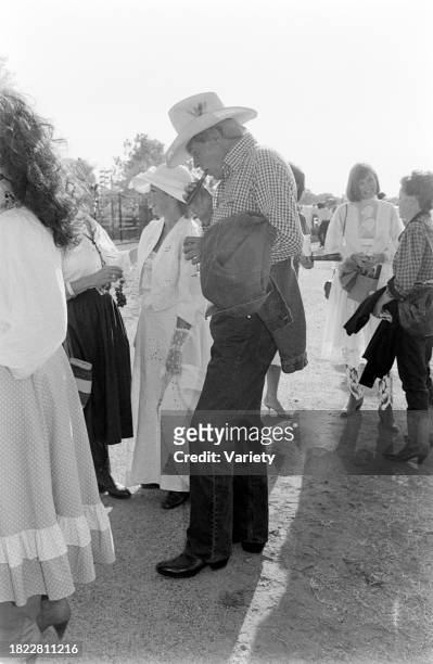 Carlyn Rosser , Howard Keel , Judy Keel , and guests attend an event, benefitting the American Cancer Society, at the Circle T Ranch in Westlake,...