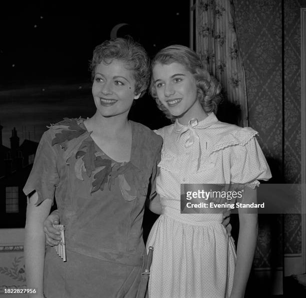 Actress Julia Lockwood , right, with her mother, actress Margaret Lockwood in stage costume during the theatre production 'Peter Pan', Scala Theatre,...