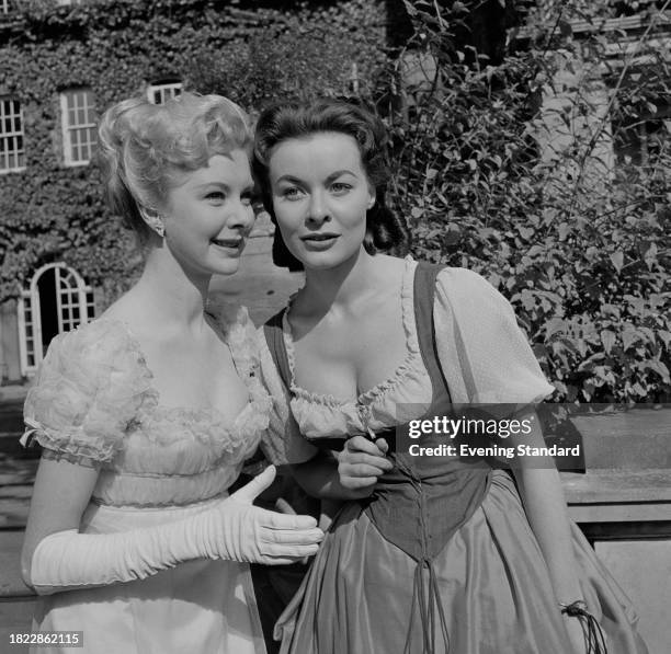 Actresses June Laverick And Anne Heywood in costume at the Pinewood Studios 21st Anniversary celebrations, Iver, Buckinghamshire, September 30th 1957.