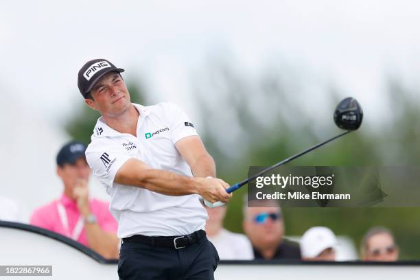 Viktor Hovland of Norway plays his shot from the fourth tee during the first round of the Hero World Challenge at Albany Golf Course on November 30,...