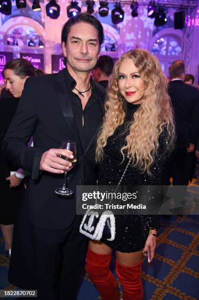 Marcus Schenkenberg and Jenny Elvers attend the 70th Movie Meets Media at Hotel Atlantic on December 4, 2023 in Hamburg, Germany.