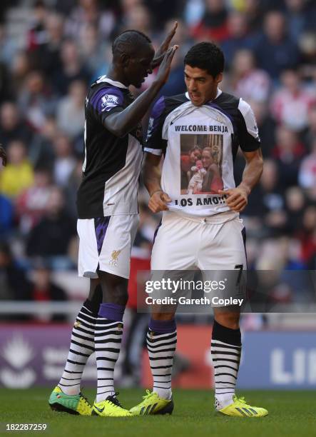 Luis Suarez of Liverpool celebrates his goal with Mamadou Sakho of Liverpool during the Barclays Premier League match between Sunderland and...