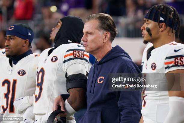 Head coach Matt Eberflus, quarterback Justin Fields, both of the Chicago Bears, look on prior to an NFL football game against the Chicago Bears at US...