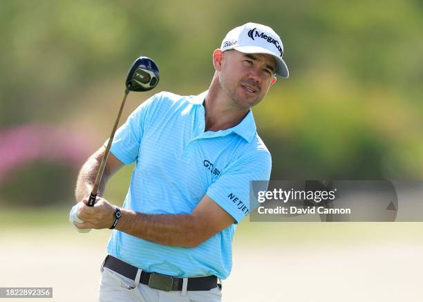 Brian Harman of The United States plays his second shot on the third hole during the first round of the Hero World Challenge at Albany Golf Course on...