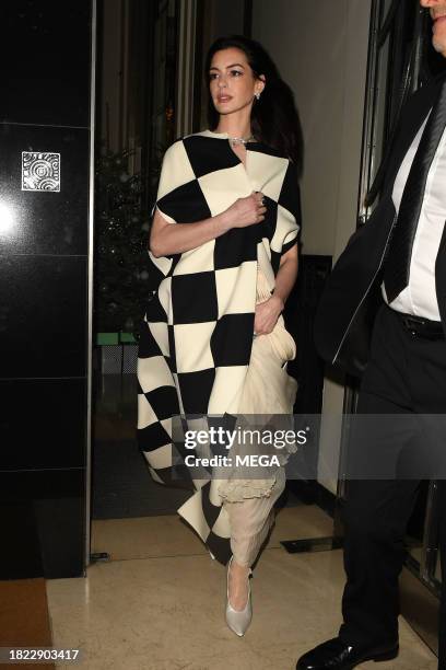 Anne Hathaway is seen leaving Claridges Hotel on December 4, 2023 in London, United Kingdom.