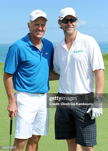 Professional Golfer Greg Norman and Slade Smiley attend the Golf Clinic with Greg Norman and Golf Tournament during Day Three of the Sandals Emerald...