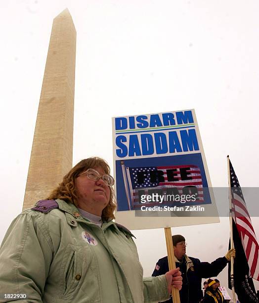Marie Shelton attends a rally near the Washington Monument March 1, 2003 in Washington, DC. The rally, attended by hundreds of people, was held to...