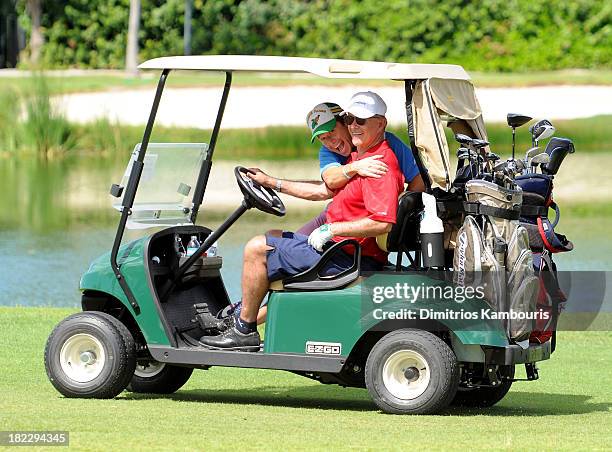 Billy Bush and Alan Thicke attend the Golf Clinic with Greg Norman and Golf Tournament during Day Three of the Sandals Emerald Bay Celebrity Getaway...