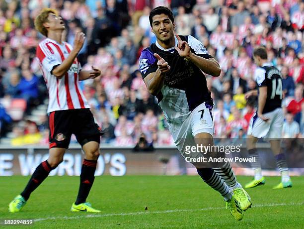 Luis Suarez of Liverpool celebrates after scoring the third goal during the Barclays Premier League match between Sunderland and Liverpool at Stadium...