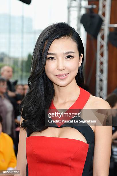 Yao Xingtong attends the Maxime Simoens show as part of the Paris Fashion Week Womenswear Spring/Summer 2014 at Orangerie du Parc Andre Citroen on...