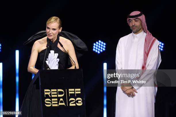 Diane Kruger speaks on stage after receiving an Honour during the Opening Ceremony at the Red Sea International Film Festival 2023 on November 30,...