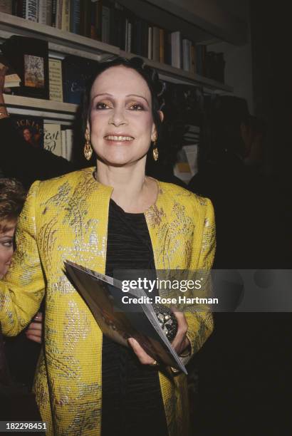 American fashion designer and writer Mary McFadden at a Gloria Vanderbilt book signing on Madison Avenue, New York City, 1996.