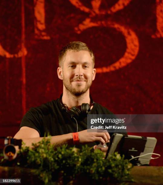 Chattahoochee Hills, GA Calvin Harris spins onstage at TomorrowWorld Electronic Music Festival on September 28, 2013 in Chattahoochee Hills, Georgia.