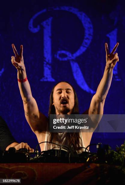 Chattahoochee Hills, GA Steve Aoki spins onstage at TomorrowWorld Electronic Music Festival on September 28, 2013 in Chattahoochee Hills, Georgia.