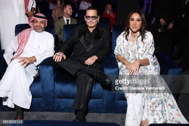 Xx, Johnny Depp and Chairwoman of the Red Sea International Film Festival, Jomana Alrashid attend the Opening Ceremony at the Red Sea International...