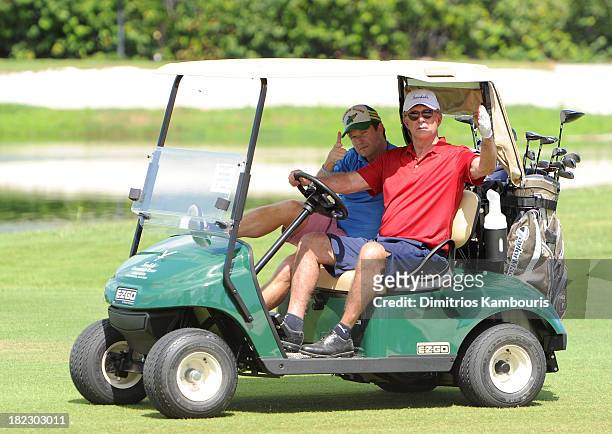 Billy Bush and Alan Thicke attend the Golf Clinic with Greg Norman and Golf Tournament during Day Three of the Sandals Emerald Bay Celebrity Getaway...