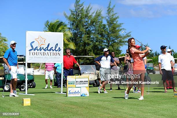 Golf Channel host Holly Sonders and Professional Golfer Greg Norman attend the Sandals Foundation Million Dollar Hole-In-One Shootout and Golf Clinic...