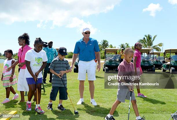 Professional Golfer Greg Norman and guests attend the Sandals Foundation Million Dollar Hole-In-One Shootout and Golf Clinic with Greg Norman during...