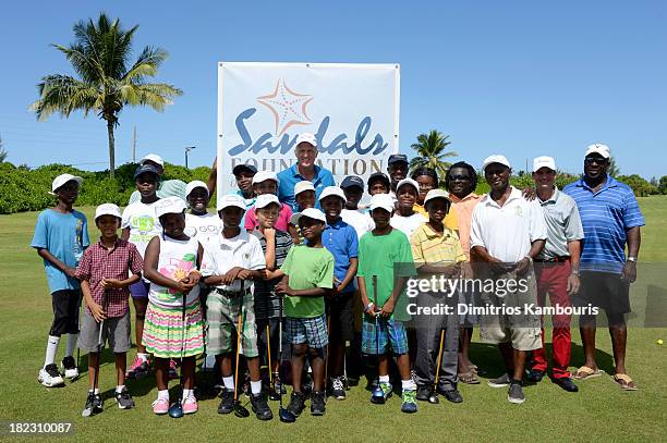 Professional Golfer Greg Norman and guests attend the Sandals Foundation Million Dollar Hole-In-One Shootout and Golf Clinic with Greg Norman during...